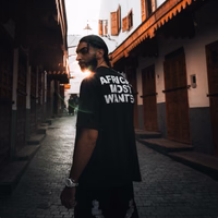 AFRICA'S MOST WANTED TEE BLACK